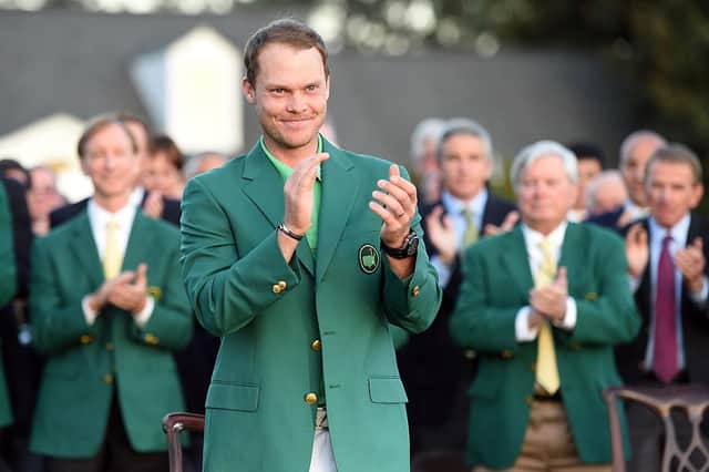 Danny Willett celebrates with the green jacket after winning the Masters in 2016. Photo: Harry How/Getty Images