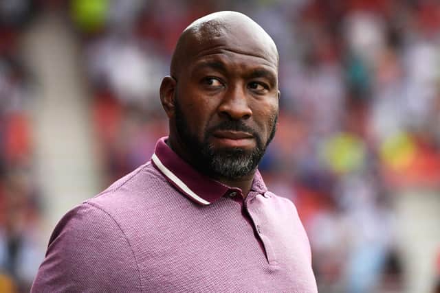 Doncaster Rovers boss Darren Moore has been linked with the vacant managerial job at Sheffield Wednesday.