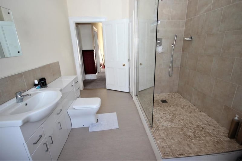 The shower room on the second floor boasts a large walk-in shower cubicle.