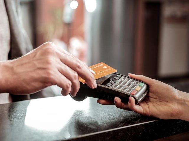 Customers are encouraged to pay via contactless payments where possible, such as through a contactless payment card or your phone (Photo: Shutterstock)