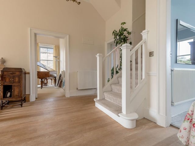 First floor landing and stairs to second floor.