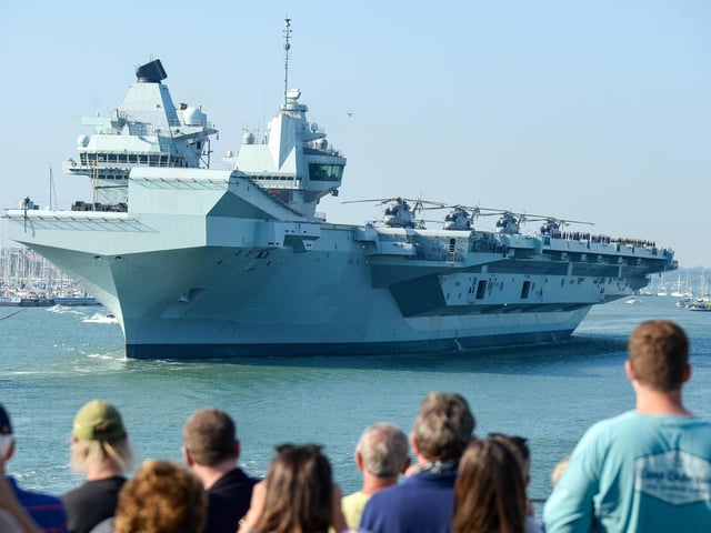 HMS Queen Elizabeth left Portsmouth on Monday afternoon and crowds came to give her a proper send-off. Picture: Finnbarr Webster/Getty Images