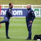 Dr Ian Mitchell, formerly of Sheffield United, with England manager Gareth Southgate at a training session last month: Nick Potts/PA Wire.