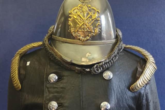 Pound's tunic and helmet