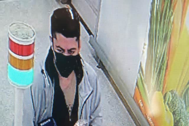 Police want to speak to this man over an investigation at a supermarket at Crystal Peaks