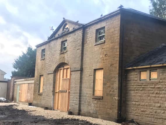 The Coach House in Hillsborough Park has been restored as part of a £1m development
