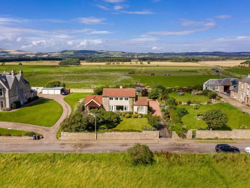 Aerial view of property and surrounding area.