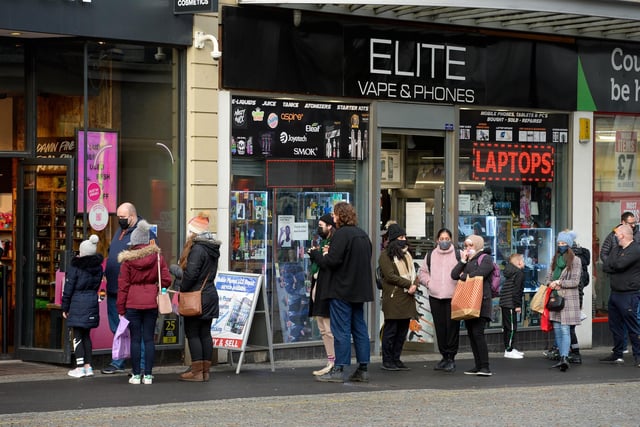 Hundreds of shoppers descended on the city centre to hunt out Boxing Day bargains. Shoppers are pictured queueing outside Lush.