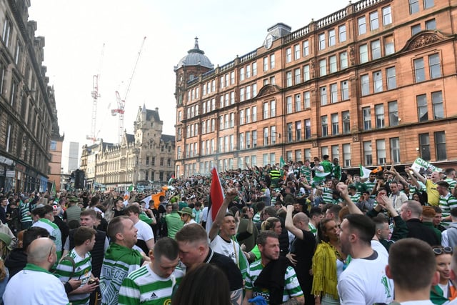 Celtic fans descended on the Merchant City and Glasgow Cross areas on Saturday to celebrate their title success