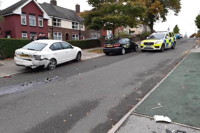 There is a large police presence on Beck Road, Shiregreen, this morning, where some damaged cars can be seen (Photo: David Kessen)