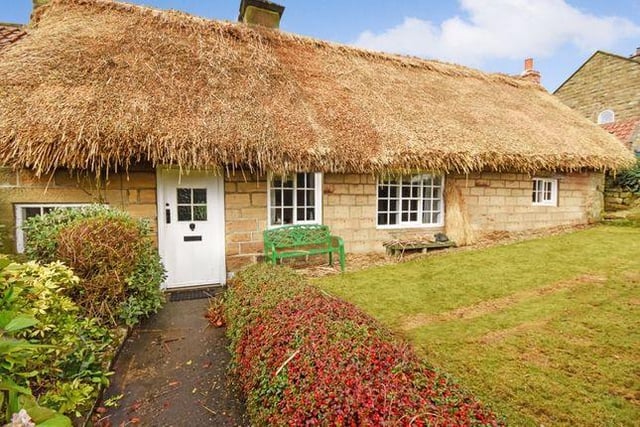This charming three bed cottage, located in Egton, Whitby, YO21 dates back to the 17th century and is a grade II listed property. The cottage boasts a recently re-thatched roof and original finishes such as wooden ceiling beams, exposed stone walls and inglenook fireplaces. Property agent: Hendersons. bit.ly/3k4C5gT