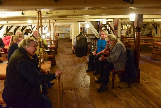 Helen Pitt and Steve Dawes sing on the HMS Trincomalee Mess Deck at the Hartlepool Folk Festival at the National Museum of the Royal Navy, on Saturday.