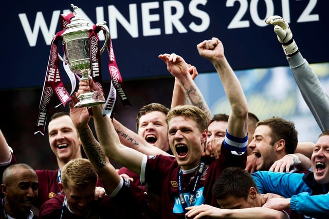 Zaliukas celebrates with his Hearts team-mates after defeating Edinburgh rivals Hibs 5-1 in the 2012 Scottish Cup final.