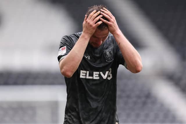 Julian Borner of Sheffield Wednesday  looks dejected after they are relegated after the Sky Bet Championship match between Derby County and Sheffield Wednesday at Pride Park Stadium. (Photo by Alex Pantling/Getty Images)