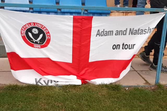 Adam Pate's Sheffield United flag, which he takes with him on his travels across Ukraine