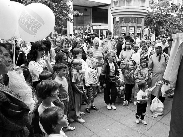 Crowds enjoying entertainment at the Castle and Sheaf Markets, Sheffield, September 1, 1990