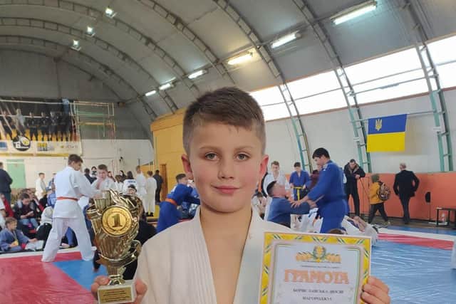 Dmytro wins a Judo prize in Ukraine before the invasion PHOTO CREDIT Pavlo Romanyuha