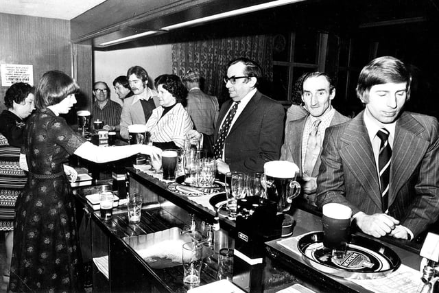 A busy bar at the Holbrook & Halfway Working Men's Club in 1977