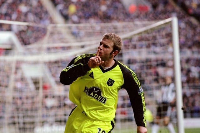Martin Smith celebrates scoring against Newcastle United in the FA Cup fourth round tie at St James' Park in January 2000.