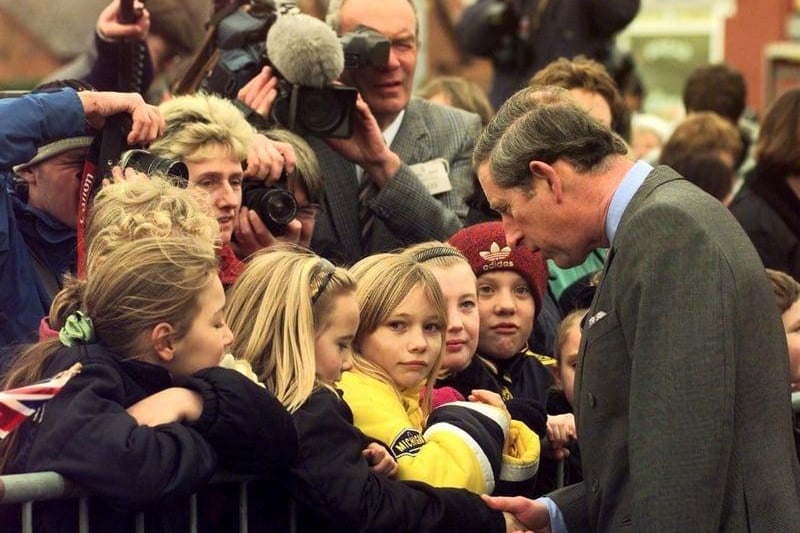 HRH meeting children on the Manor Estate in 1998.