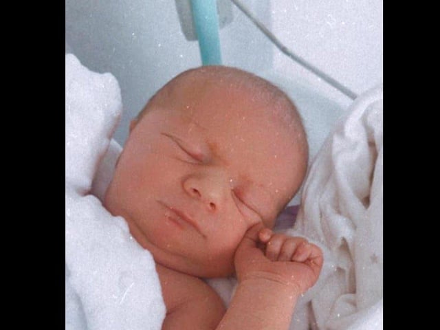 Albie Kevin George Moore was born on May 3.