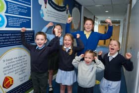 Pupils at St joseph's in Dinnington celebrate their much improved OFSTED report