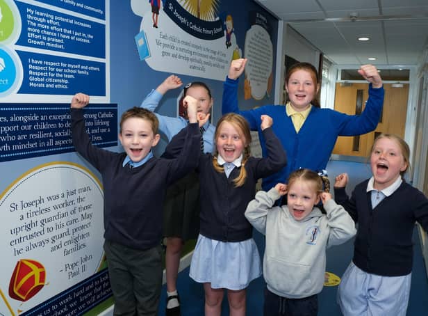 Pupils at St joseph's in Dinnington celebrate their much improved OFSTED report