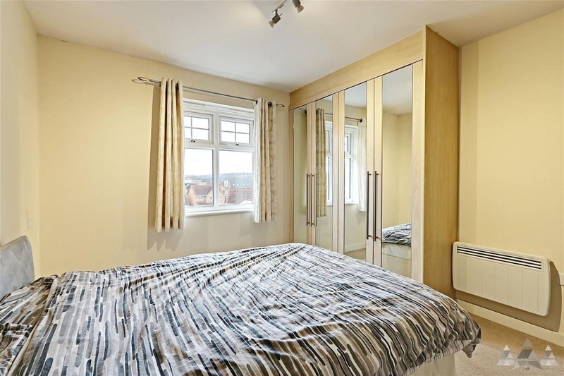 The bedrooms have a range of fitted wardrobes and are situated either side of the modern bathroom.