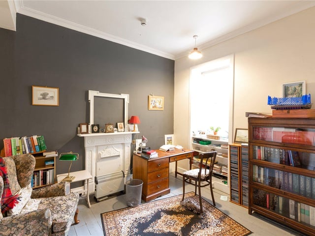 Current owners have turned one of the rooms into a handy home office.