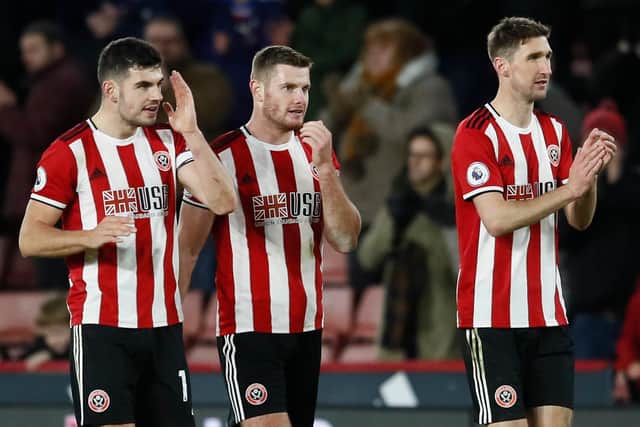 John Egan, Jack O’Connell and Chris Basham were integral to United's success last season, but have played 83 minutes together this: Simon Bellis/Sportimage