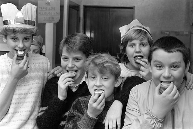 Tucking into cakes at a children's Christmas party
