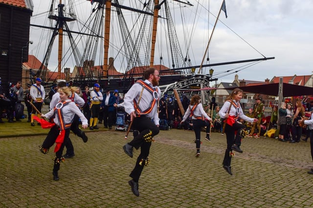Dancing in front of the impressive HMS Trincomalee.