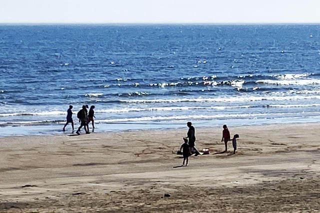 Visitors keep their distance on the beach at Seaton Carew. Picture by FRANK REID