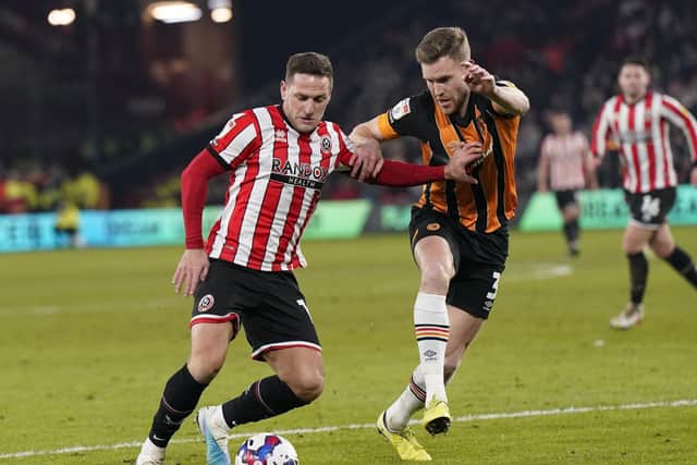 Sheffield United captain Billy Sharp in action against Hull City: Andrew Yates / Sportimage