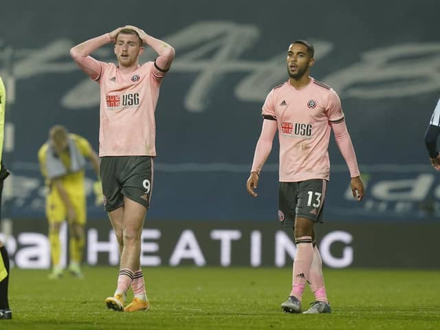A frustrated Oli McBurnie (L) alongside his Sheffield United team mate Max Lowe: Andrew Yates/Sportimage