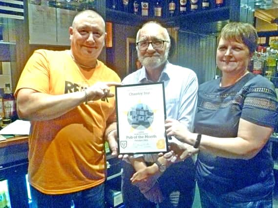 Managers of the Chantry Inn, Terry and Alison, awarded with pub of the month by CAMRA