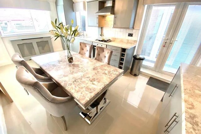 Marbled surfaces and light colours gives the property a fresh look.