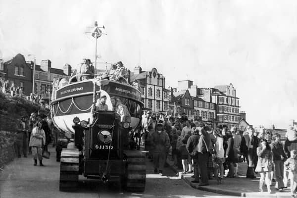 Crowds of holidaymakers at Bridlington and the Bridlington lifeboat in 1974