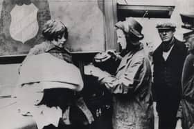 105blitz.105: This'll put roses in your cheeks. A cup of tea from a Salvation Army canteen in Sheffield, December, 1940.