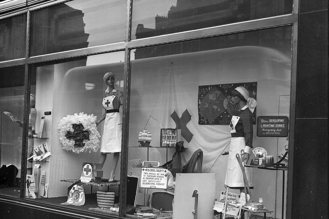 A window display of a shop on North Bridge marking Red Cross Week in May 1963.