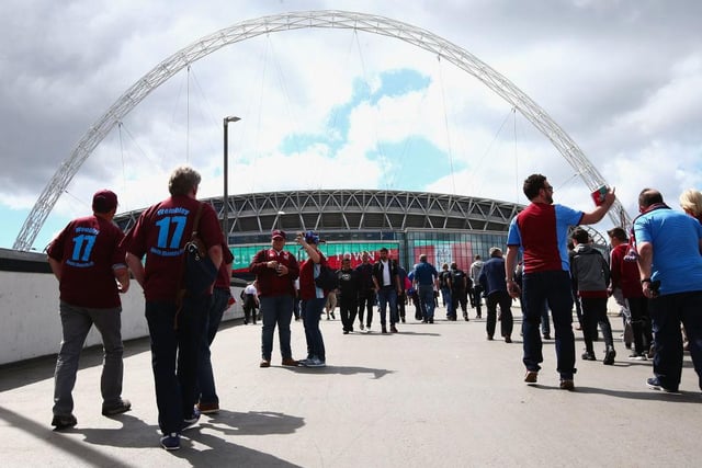 South Shields fans make their way to the stadium prior to the Buildbase FA Vase Final between South Shields and Cleethorpes Town at Wembley Stadium.