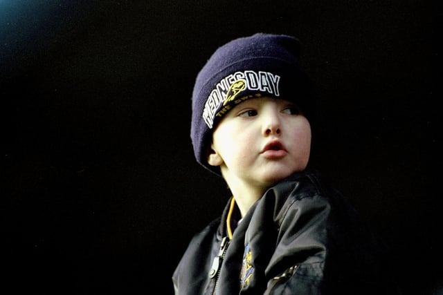 A young Wednesday fan watches the action during the FA Carling Premier League match against Middlesbrough at Hillsborough on Boxing Day 1999.