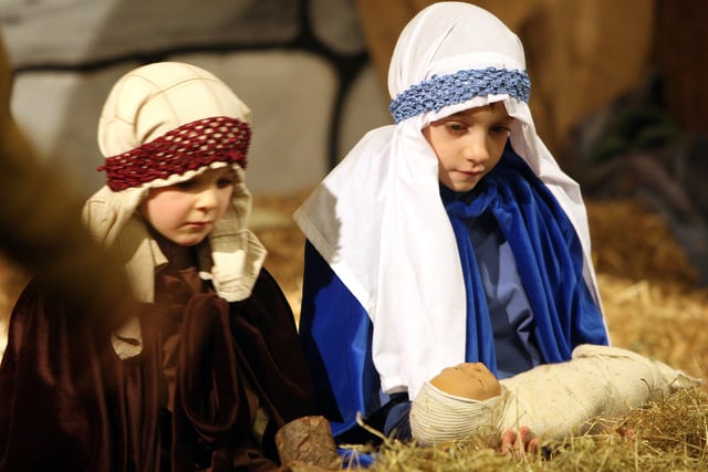 Mary and Joseph reveal the infant Jesus to the world in the Chatsworth House Christmas nativity in 2008