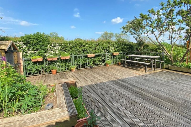 Zoopla says the property has "beautiful private gardens and a patio".