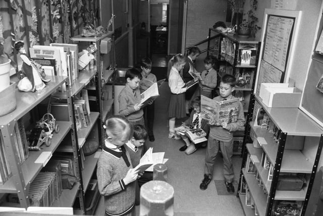 Diamond Hall Infant and Junior School  pupils look fascinated by their books in this 1991 scene.