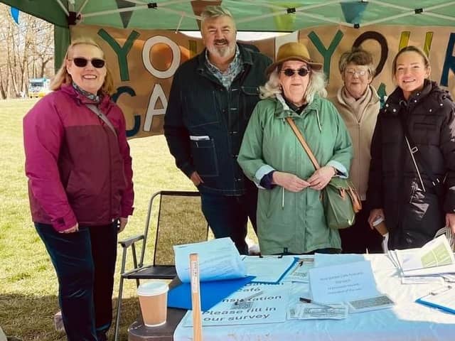 Members of the Rose Garden Cafe partnership holding a stall in Graves Park, Sheffield to gather responses to a public consultation on the future of the building. Picture: Andy Kershaw