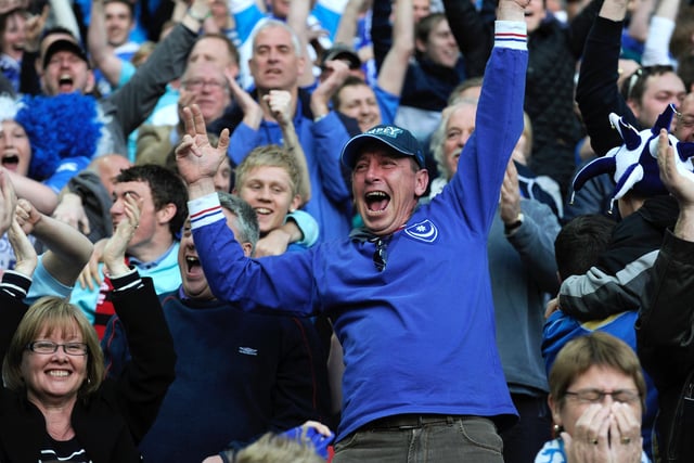 Pompey fans celebrate the 2-0 extra-time victory.