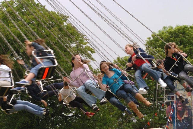 Who can you spot in the swings at Sheffield Mayfest in Hillsborough Park in 2004?