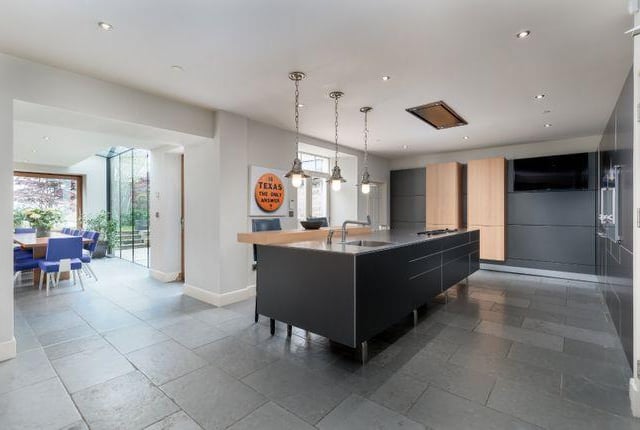 The bespoke kitchen features state of the art appliances