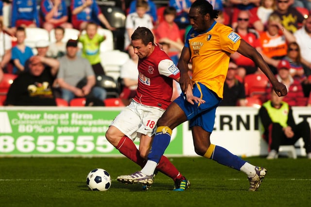 Long throw specialist Exodus Geohaghon joined Stags on loan on 24 February 2012 after Darlington's financial difficulties. He played an important role in Stags getting to the Conference Premier play-offs before being beaten by York. He is pictured here challenging Jamie McGuire for the ball.